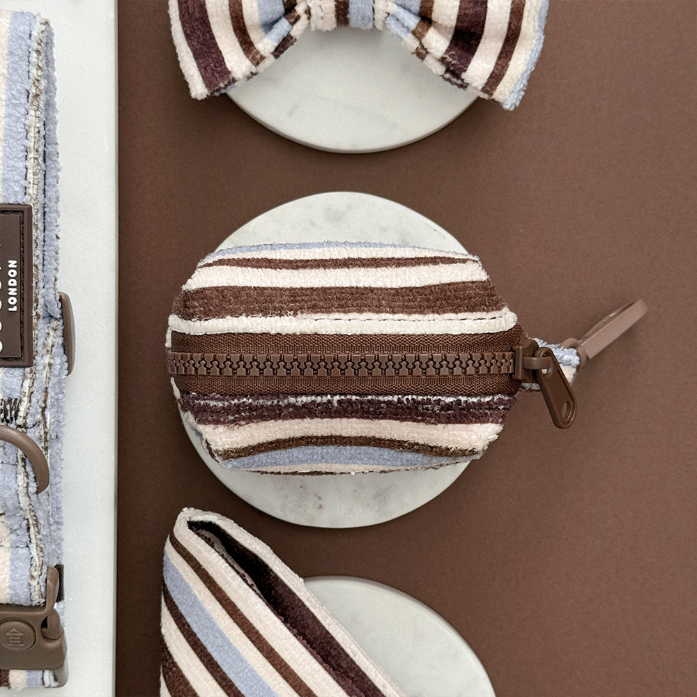 Brown, blue and white striped Poop Bag Holder to hold two rolls of dog poo bags. With zip closure.