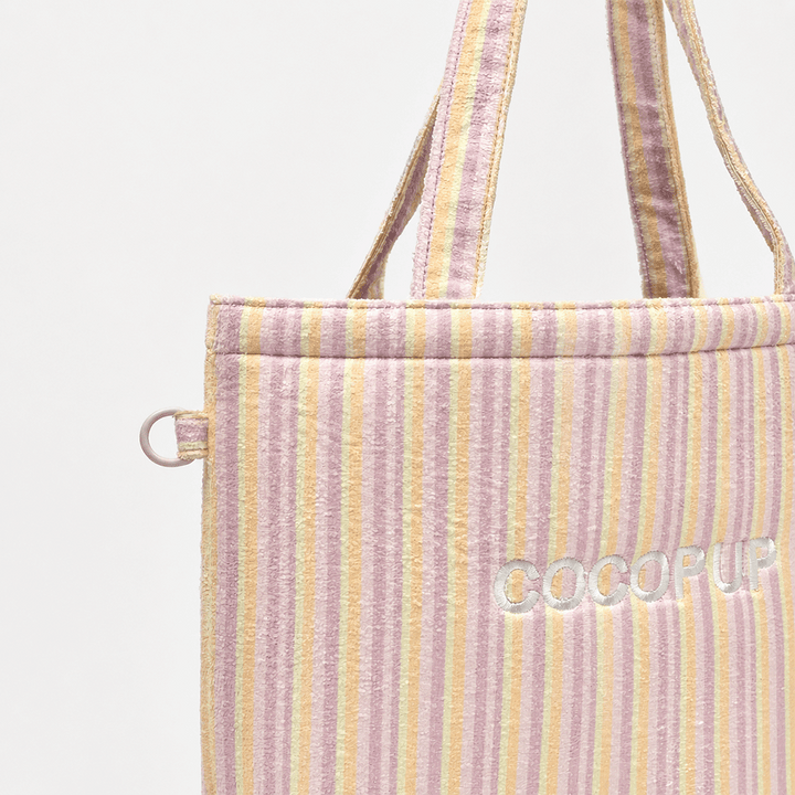 Pink, yellow and orange striped Tote Bag with D-Ring on side.