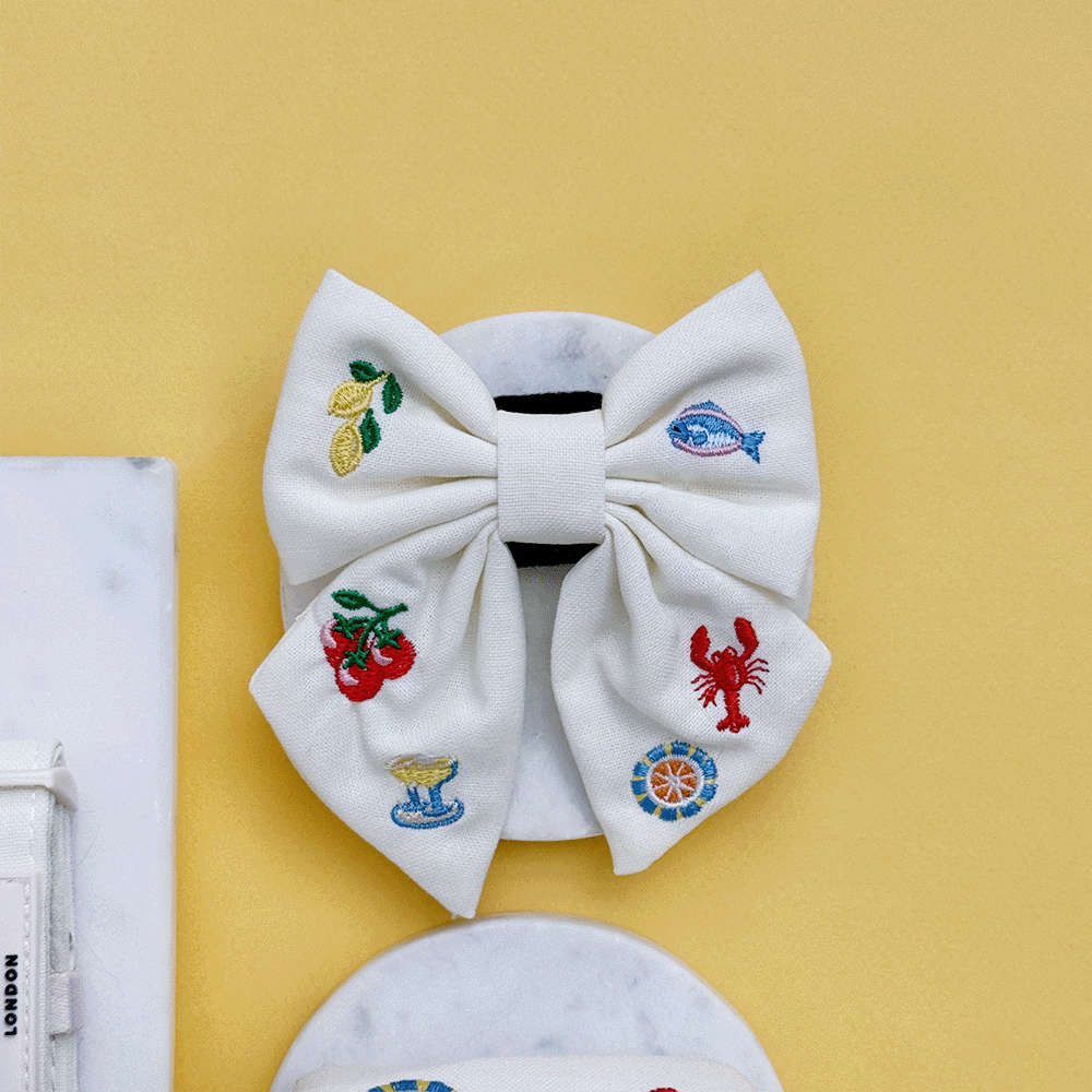 White linen fabric Dog Sailor Bow Tie with summer embroidered embellishments.