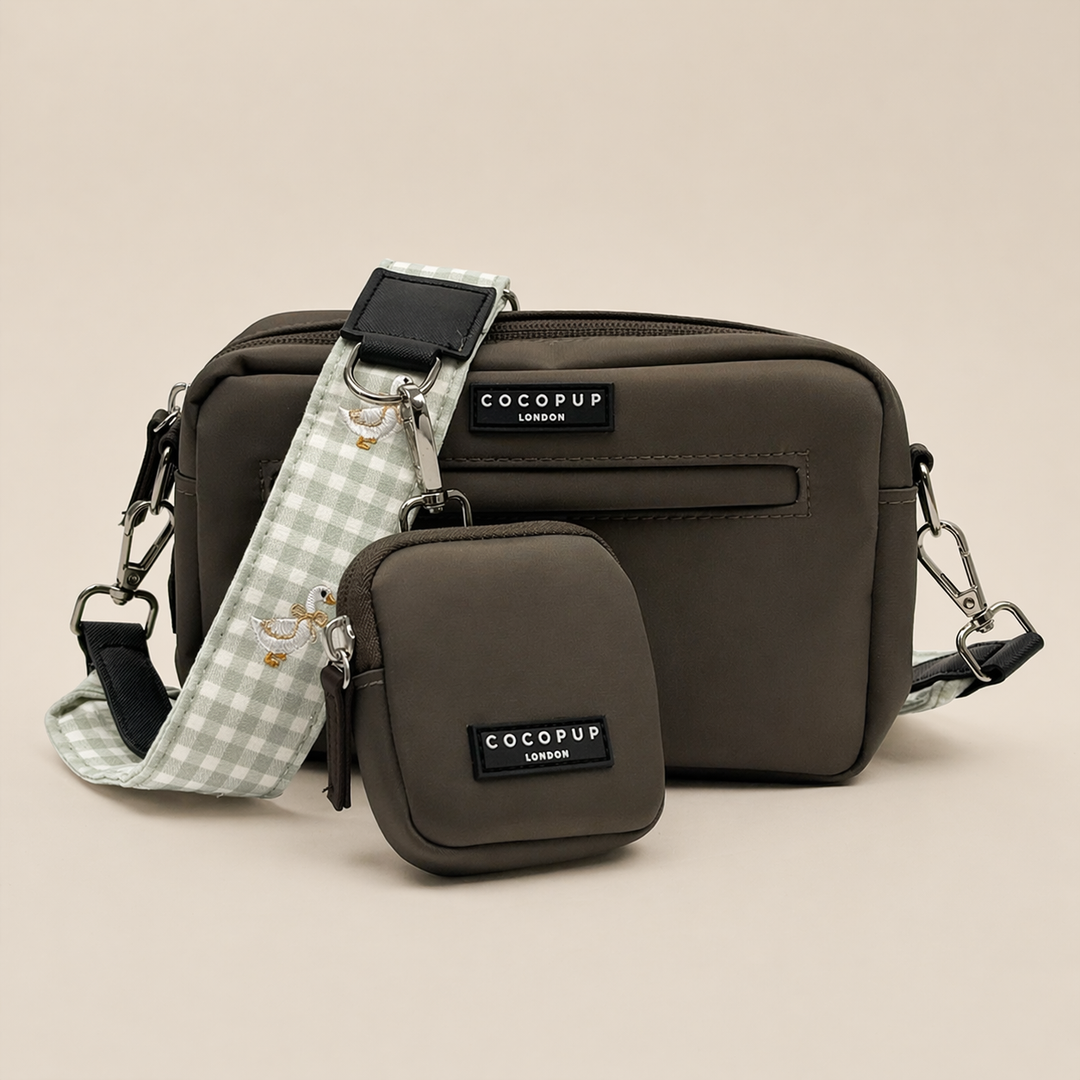 Cocopup mocha coloured dog walking bag, with green and white check print bag strap attached.